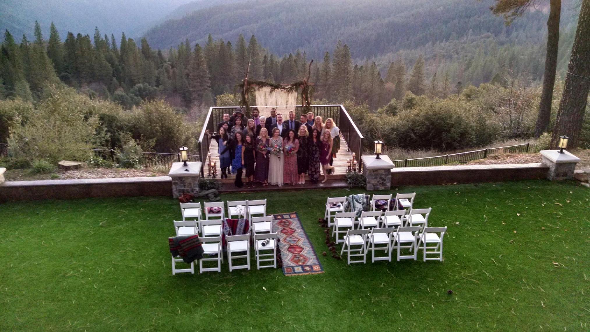 An intimate anti-wedding at an outdoor mountain venue.